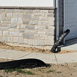 Ashburn Homes - they put 12" of mulch to cover the bottom of the stone which is missing in places