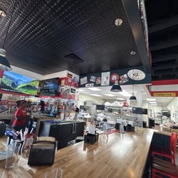Waldo's Chicken & Beer - Bar area with amazing art on the walls