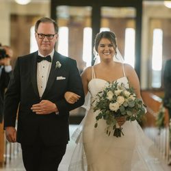 The Refined Host - Our bride looking radiant as she walks down the aisle