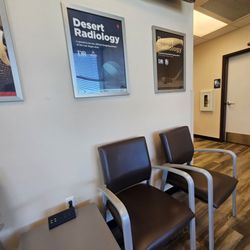 Desert Radiology - Outlets for plugs and USB cords, and TV for news