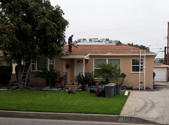 Slide of MRK Roofing Services