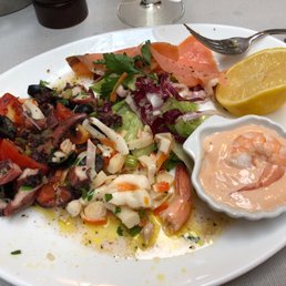 Mixed seafood salad. Outstanding. Grilled octopus, smoked salmon, calamari,shrimp, fresh tomatoes, olives, perfectly dressed. Mixed seafood salad. Outstanding. Grilled octopus, smoked salmon, calamari,shrimp, fresh tomatoes, olives, perfectly dressed.