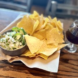 The Brass Tap - House-made Guacamole with fresh jalapeños, onion, and cilantro. And a glass of Lindeman's Framboise.