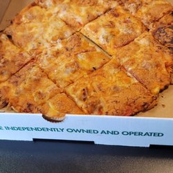 Imo's Pizza - A St Louis style sausage with the processed provel cheese and the non-yeast cracker light crust