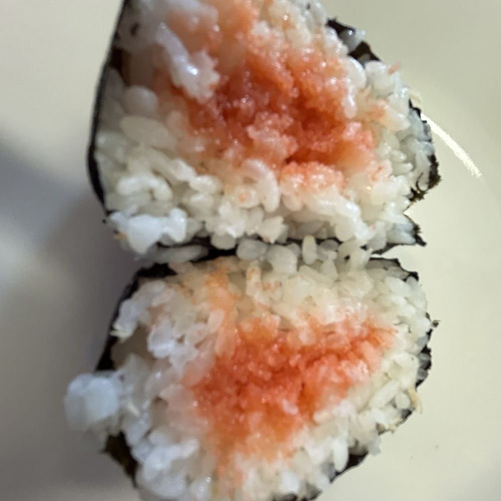 Mana Bu's - Cross section of mentaiko musubi - Japanese Near Me - Honolulu, Hawaii Mana Bu's - Cross section of mentaiko musubi - Japanese Near Me - Honolulu, Hawaii