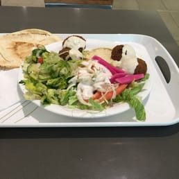 a plate of food on a table a plate of food on a table