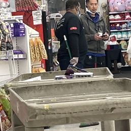 The man in the black shirt