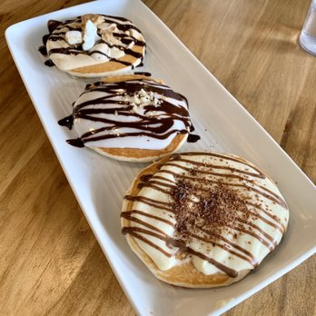 Egghead Cafe - Trio love pancakes - s'mores, Mac nut choco, and tiramisu! ($14) - Coffee & Tea Near Me - Honolulu, Hawaii Egghead Cafe - Trio love pancakes - s'mores, Mac nut choco, and tiramisu! ($14) - Coffee & Tea Near Me - Honolulu, Hawaii