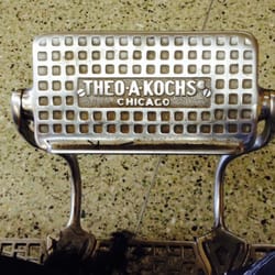 Southfield Barber Shop - How many feet have perched up on this barber chair footrest in all this time? Mine own since 1986! Love that its made in Chicago
