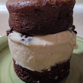 Kaylena Marie's Bakery - Chocolate Chip Cookie Dough Tower: Delicious brownie pucks; Dense, generous amount of edible cookie dough w/tons of chocolate chips! - Cafes Near Me - Orchard Park, New York Kaylena Marie's Bakery - Chocolate Chip Cookie Dough Tower: Delicious brownie pucks; Dense, generous amount of edible cookie dough w/tons of chocolate chips! - Cafes Near Me - Orchard Park, New York