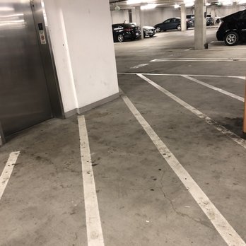 Domain San Diego - lower level parking garage-dirt, food, etc... that had not been power washed in months! More bugs are starting to appear because of this! - Apartments Near Me - San Diego, California