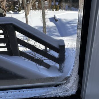 Brightview Glass Replacement - Opposite corner of the same left-side pane showing interior frost buildup - Glass & Mirrors Near Me Brightview Glass Replacement - Opposite corner of the same left-side pane showing interior frost buildup - Glass & Mirrors Near Me