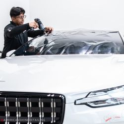 American Shine Detailing - Polestar 1 getting Kavaca Ceramic IR film installed on windshield to cut down on heat and UV rays.