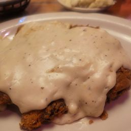 Country fried steak with mash in the background (a bit heavy on the gravy. Ask for it on the side)