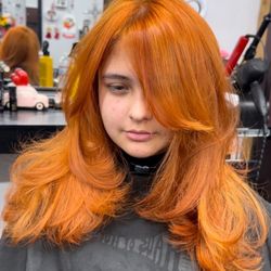 Guys & Dolls Hair Fashion - Bright bold copper and layered haircut