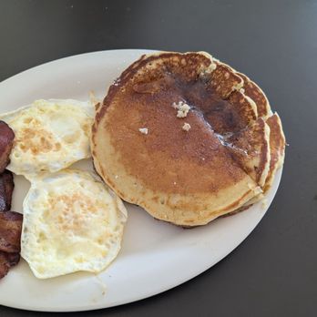 Eggs Up Grill - Pancake with fried egg and bacon - American Near Me - Rome, Georgia Eggs Up Grill - Pancake with fried egg and bacon - American Near Me - Rome, Georgia
