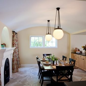 Tile by Design - a dining room with a fireplace - Building Supplies Near Me - Plymouth, Minnesota Tile by Design - a dining room with a fireplace - Building Supplies Near Me - Plymouth, Minnesota