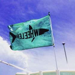Custom "Shark Wheeler" boat flag. One of our all time favorite designs!