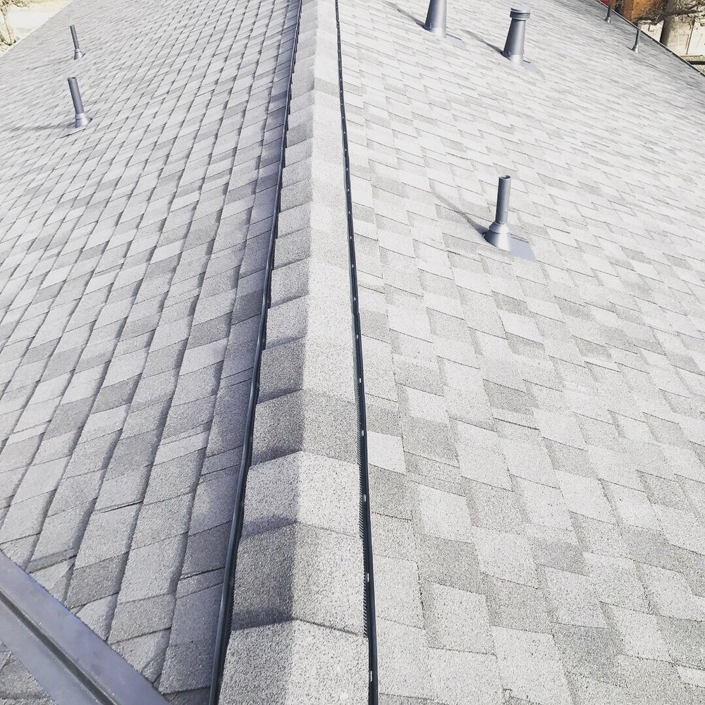 Slide of Kelly Roofing