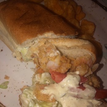 Salt & Ivy, A Coastal Kitchen - Shrimp po boy!!! Don't let the appearance derail you it's FANTASTIC!!!! - New American Near Me - Biloxi, Mississippi Salt & Ivy, A Coastal Kitchen - Shrimp po boy!!! Don't let the appearance derail you it's FANTASTIC!!!! - New American Near Me - Biloxi, Mississippi
