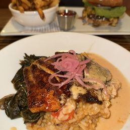 BLACKENED NC CATFISH andouille jambalaya, collard greens, honey- tabasco butter // burger in the back