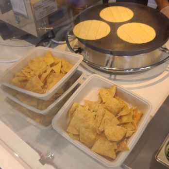 Guapas Mexican Grill - Corn tortillas being warmed up on a grill - Mexican Near Me - Menlo Park, California Guapas Mexican Grill - Corn tortillas being warmed up on a grill - Mexican Near Me - Menlo Park, California