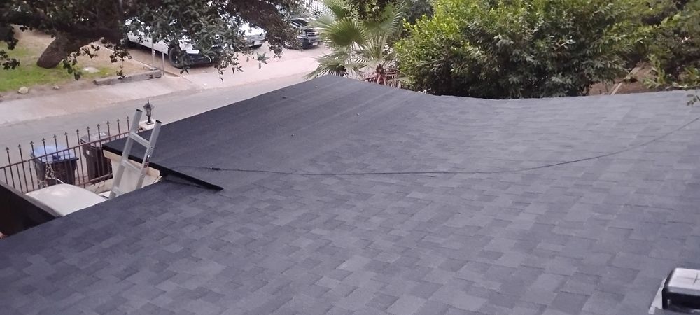 Slide of Spikes Roofing