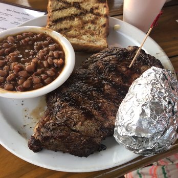 The Grill House - 16oz ribeye - all the sides are unlimited and come with the steak! (Not pictured is the salad too!) - Steakhouses Near Me - Allegan, Michigan The Grill House - 16oz ribeye - all the sides are unlimited and come with the steak! (Not pictured is the salad too!) - Steakhouses Near Me - Allegan, Michigan