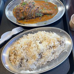 Lamb shank with half portion of Roshona biryani Lamb shank with half portion of Roshona biryani