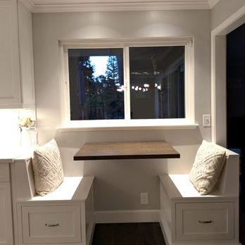 Crawford Woodworks - two booth seats with pull out storage drawers and a floating table. - Cabinetry Near Me - Richmond, California