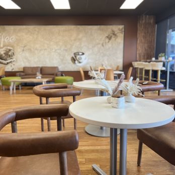 Lucy Coffee House - tables and chairs in a coffee shop - Coffee Roasteries Near Me - Aurora, Colorado Lucy Coffee House - tables and chairs in a coffee shop - Coffee Roasteries Near Me - Aurora, Colorado