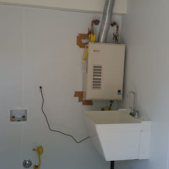 Bias Plumbing - a bathroom with a sink and a heater - Plumbing Near Me - Poway, California Bias Plumbing - a bathroom with a sink and a heater - Plumbing Near Me - Poway, California