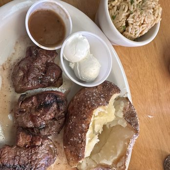 Texas Roadhouse - Filet Medallions* with baked potato and rice - Steakhouses Near Me - Burlington, North Carolina Texas Roadhouse - Filet Medallions* with baked potato and rice - Steakhouses Near Me - Burlington, North Carolina