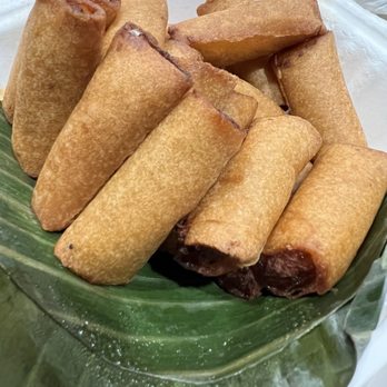 Cooked By Gio - a plate of food on a banana leaf - Filipino Near Me - American Canyon, California