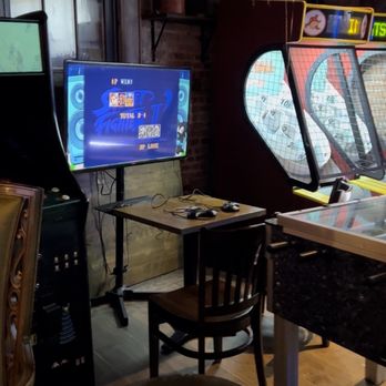 The Upstairs at 66 - a row of arcade machines - Lounges Near Me - New York, New York The Upstairs at 66 - a row of arcade machines - Lounges Near Me - New York, New York