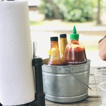 The Pig & Pint - A little Asian flavor with the sriracha in its condiments bucket. - Barbeque Near Me - Jackson, Mississippi The Pig & Pint - A little Asian flavor with the sriracha in its condiments bucket. - Barbeque Near Me - Jackson, Mississippi