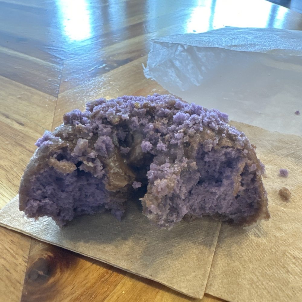 Dynamite Donuts - Ube - 1/2 eaten, sorry... looked to good to not eat right away - Donuts Near Me - Hercules, California Dynamite Donuts - Ube - 1/2 eaten, sorry... looked to good to not eat right away - Donuts Near Me - Hercules, California