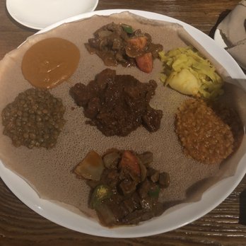Massawa - Beef Tebsi and Tsebhi Beghe with assorted veggie sides - Ethiopian Near Me - New York, New York Massawa - Beef Tebsi and Tsebhi Beghe with assorted veggie sides - Ethiopian Near Me - New York, New York