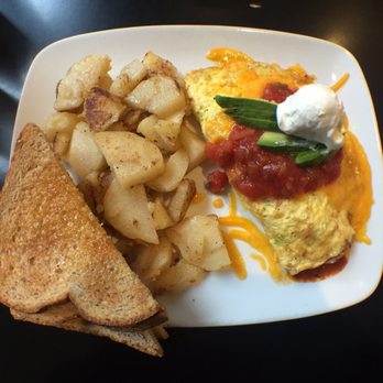 Break Your Fast - Overhead view of South of the Border Omelette with potatoes and toast - American Near Me - Union City, California Break Your Fast - Overhead view of South of the Border Omelette with potatoes and toast - American Near Me - Union City, California