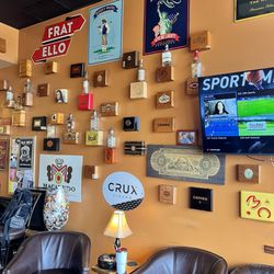 Eldorado Fine Cigars - Comfy leather chairs and cigar boxes on the wall.