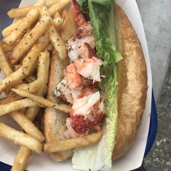 Claws - Naked Lobster Roll $22- served on a huge hoagie roll, minimal lobster meat- wasn't impressed in the slightest! - Seafood Near Me - West Sayville, New York