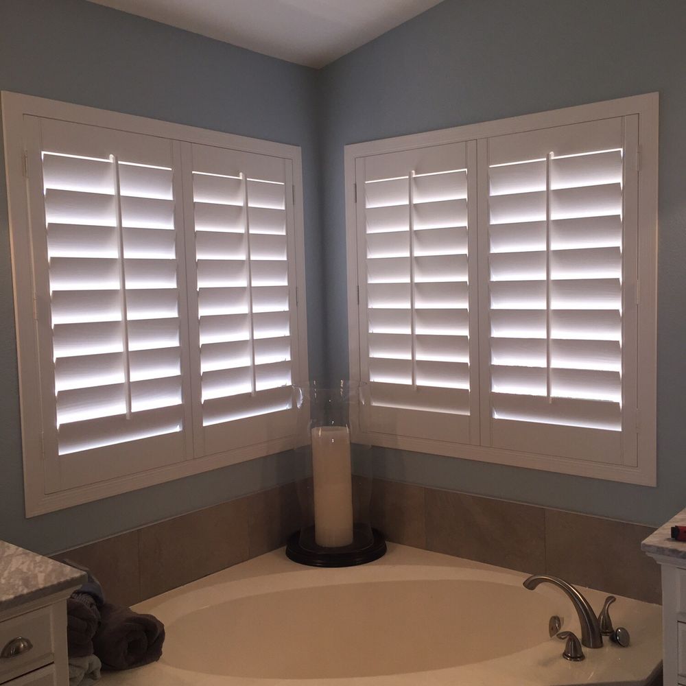 Boyd's Blinds - The white shutters look so gorgeous against a pop of color on the walls and the privacy these offer are amazing. - Shades & Blinds Near Me - Phoenix , Arizona
