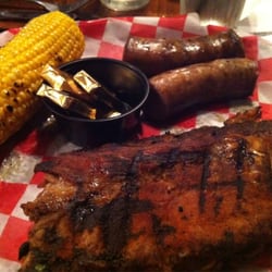 Smoked Bar & Grill - Ribs and sausage from the smoker and a side of corn on the cob.
