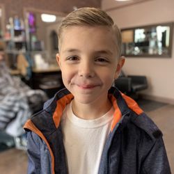 Ayman's Barbershop - In the shop right after his haircut