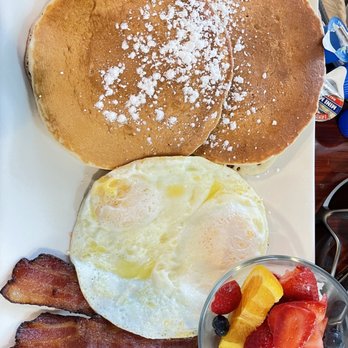 London Cafe - Alex with pancakes and over easy eggs - Breakfast & Brunch Near Me - Houston, Texas London Cafe - Alex with pancakes and over easy eggs - Breakfast & Brunch Near Me - Houston, Texas