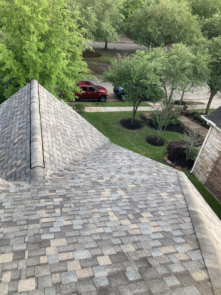 Slide of Compass Roofing