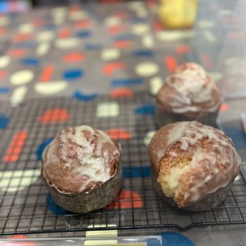 Unregular Bakery - three cupcakes on a cooling rack - Bakeries Near Me - New York, New York Unregular Bakery - three cupcakes on a cooling rack - Bakeries Near Me - New York, New York