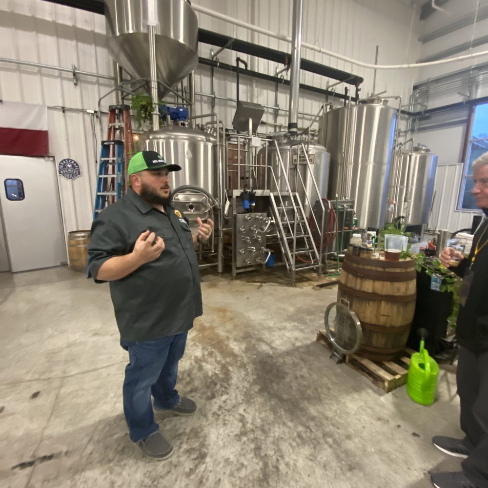 Learning about the brewing process at Family Business. Learning about the brewing process at Family Business.