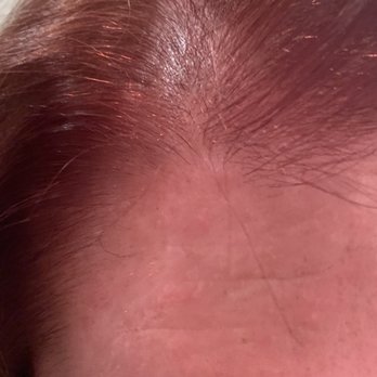 Supercuts - This is where they took a scissors and instead of trimming my bangs she cut off my bangs at the scalp - Hair Salons Near Me - ENCINO, California