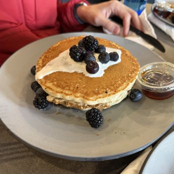 Heirloom - Stacked buttermilk pancakes with whipped cream and berries - Breakfast & Brunch Near Me - Weston, Massachusetts